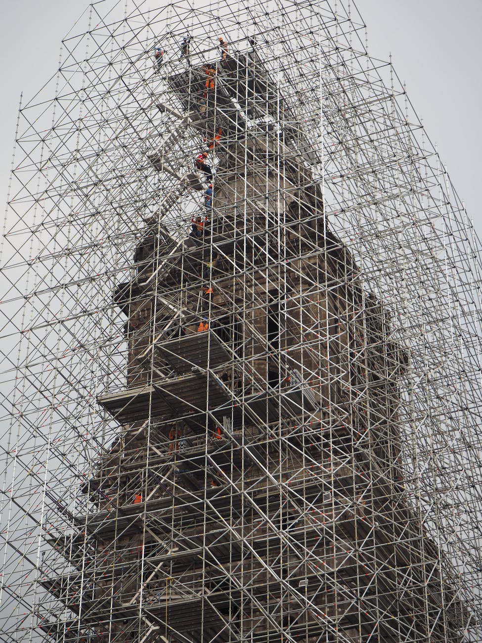 scaffolding around tower under construction